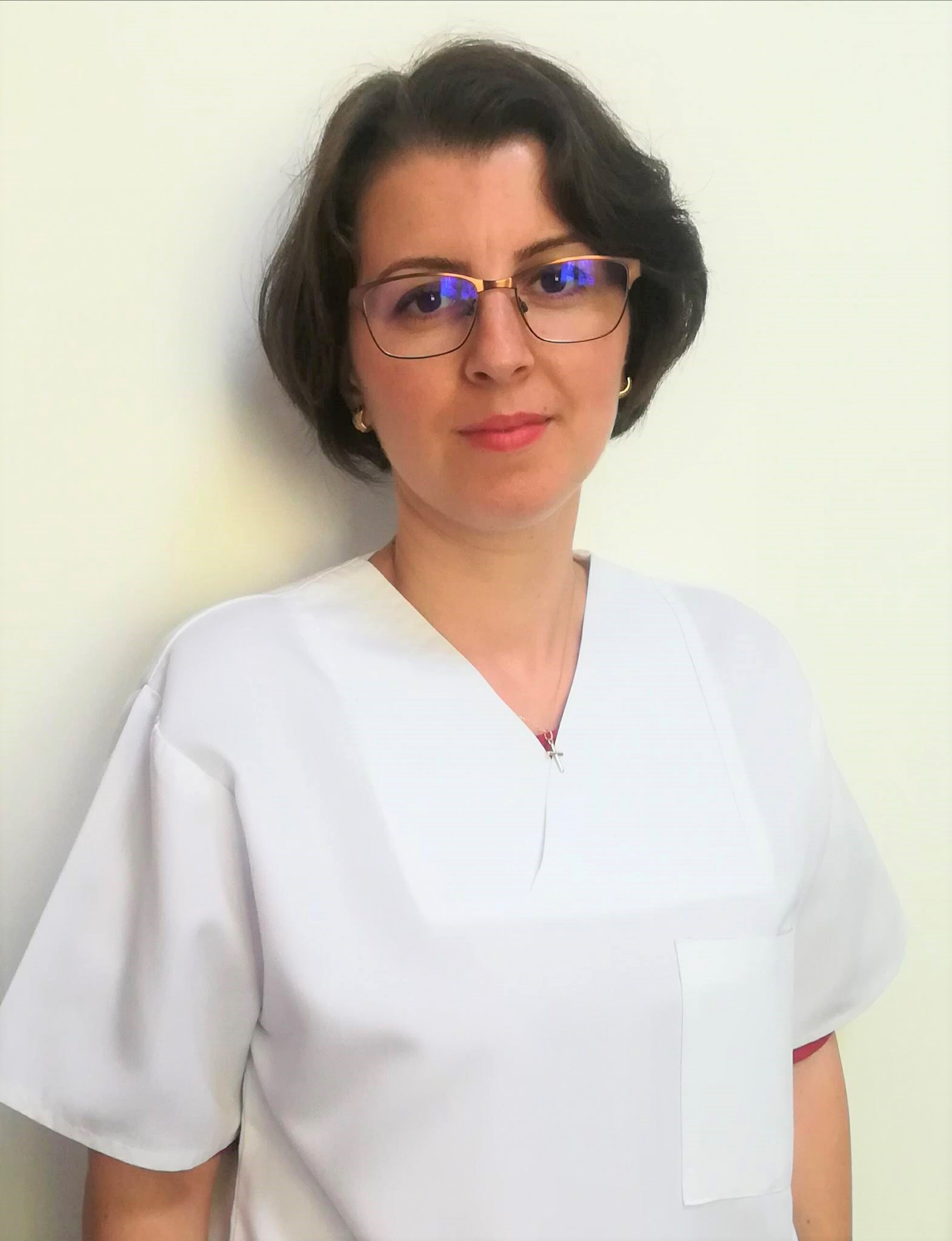 Dr. Cristina Toader